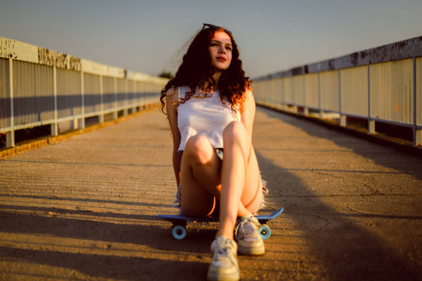 istock Girl With Skateboard 1349142247