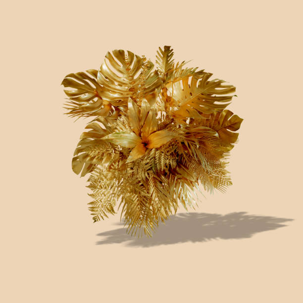 istock Golden leaf cluster with bright gray background and sun shadow tropical summer concept. 1349146850