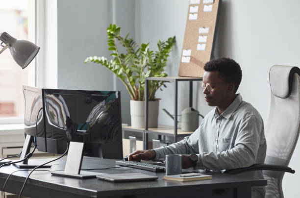 istock Young African American Man Working at Desk 1349150508