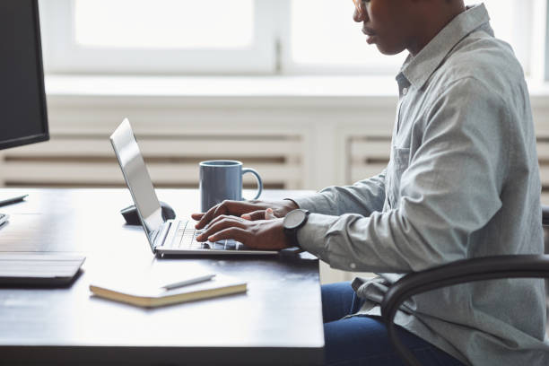 istock African American Man Typing Side View 1349150509