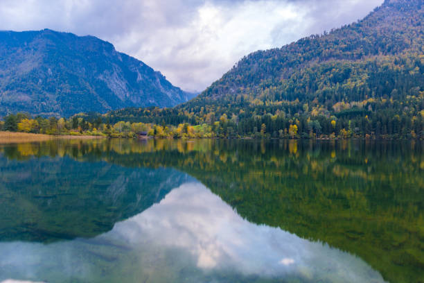 istock Alpine lake reflection in Austria 1349150517