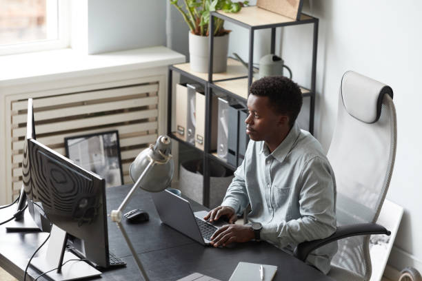 istock Young African American Man Working in Office 1349150518