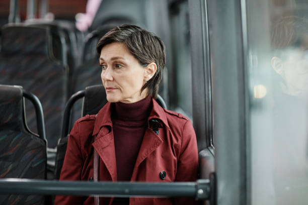 istock Pensive Woman on Bus 1349155525