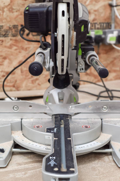 istock Compound Mitre Saw in a carpentry workshop used for wood work and cutting materials 1349159140