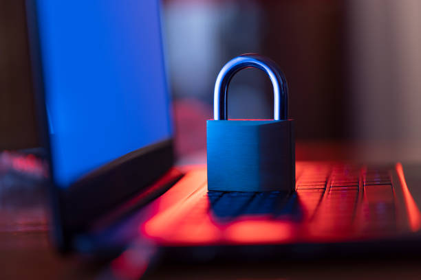 istock Safety in the internet concept with laptop and padlock 1349159145