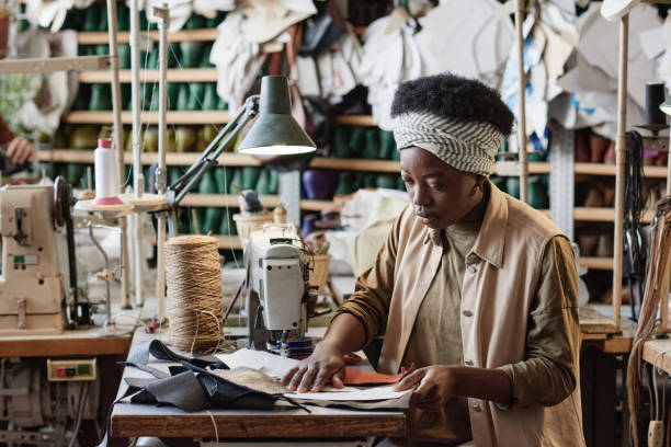 istock Tailor sewing products in the factory 1349164146