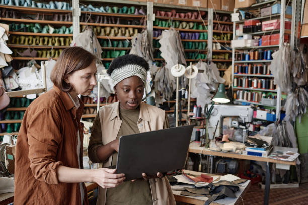 istock Colleagues discussing work online in the workshop 1349164188