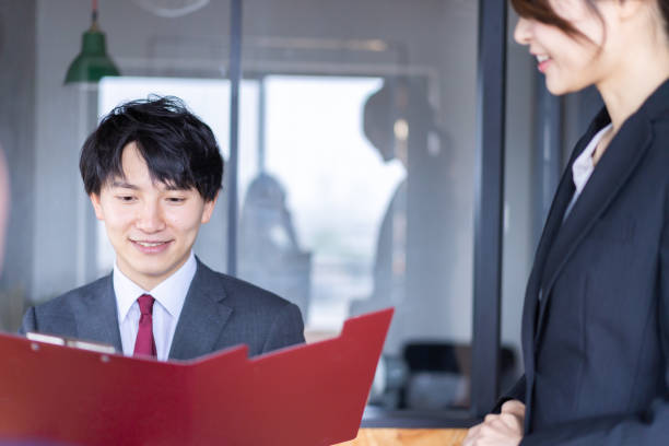 istock Female restaurant staff confirming an order 1349165704