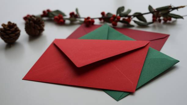 Letters and envelopes with festive decorations. Happy New Year and greeting postcards. Christmas Color Palette