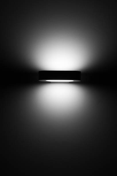 istock Light of lamp in darkness 1349170463