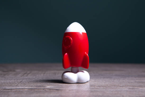 a small rocket on the table - ispiration imagens e fotografias de stock