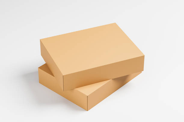 istock Two cardboard boxes lying on each other on a light background. Packaging, gift. Mock up. 3d rendering 1349174224