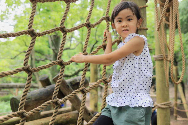 istock Japanese student girl playing with rope walking (6 years old) 1349175291