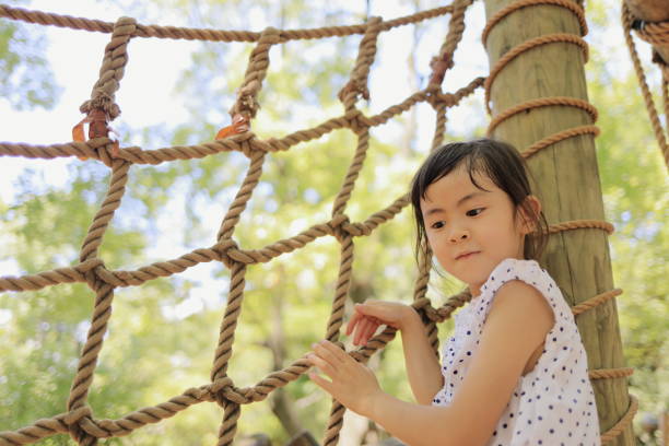 istock Japanese student girl playing with rope walking (6 years old) 1349175318