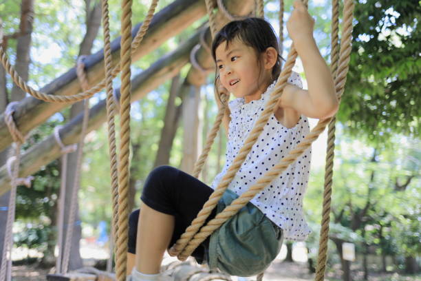 istock Japanese student girl playing with rope walking (6 years old) 1349175347