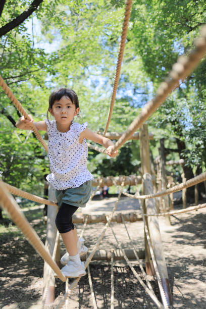 istock Japanese student girl playing with rope walking (6 years old) 1349175366