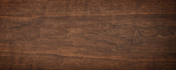 istock dark wood texture. brown walnut texture, natural background 1349175505
