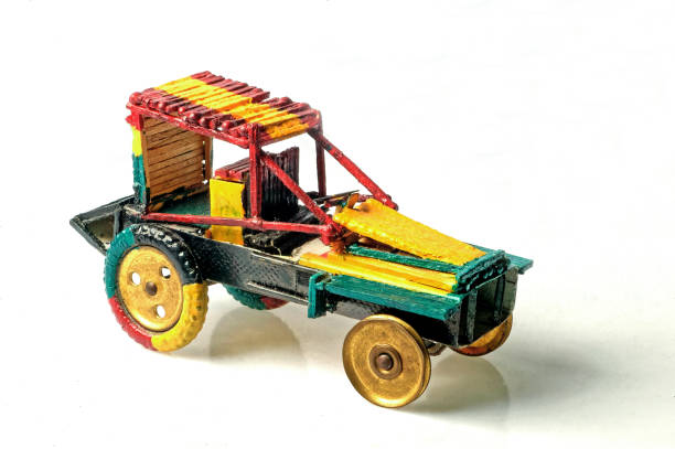 Yellow Green Red Hand Maid Toy Car With Matchbox stock photo