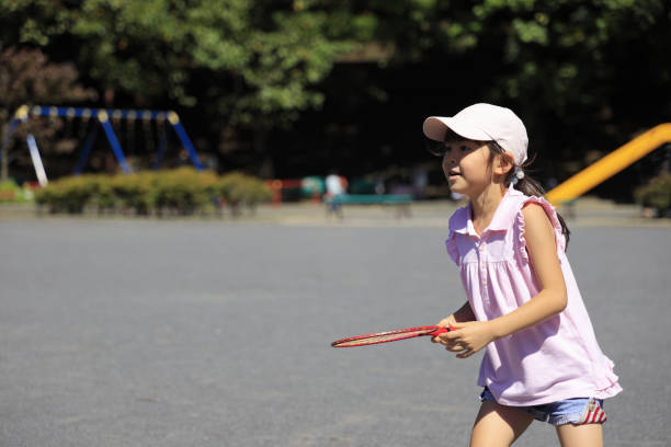 istock Japanese student girl playing badminton (6 years old) 1349176969