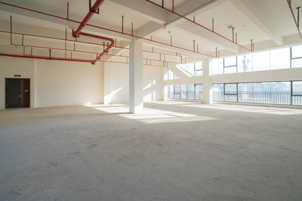 istock Undecorated interior space of office building 1349178664