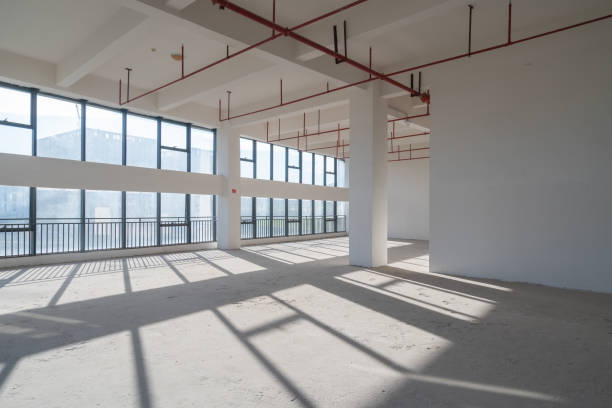 istock Undecorated interior space of office building 1349178713