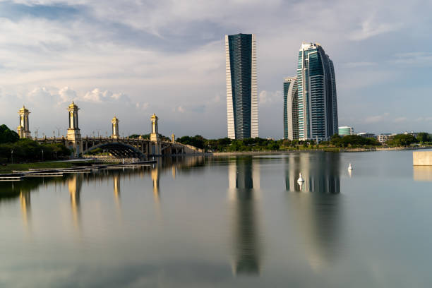 istock Reflection of a bridge and buildings on a lake 1349179065