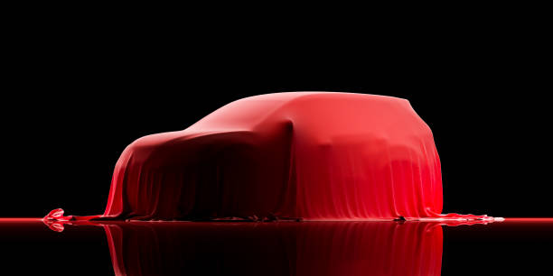 istock The SUV car is covered with red cloth on a black background. 3d rendering 1349179994