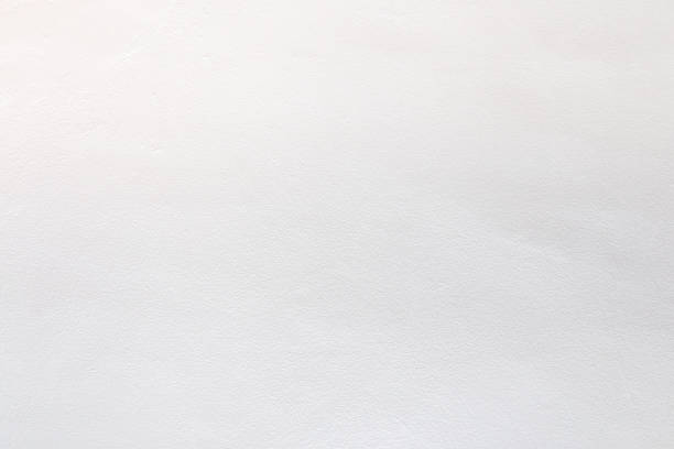 istock White color old grunge wall concrete texture as background. 1349180178