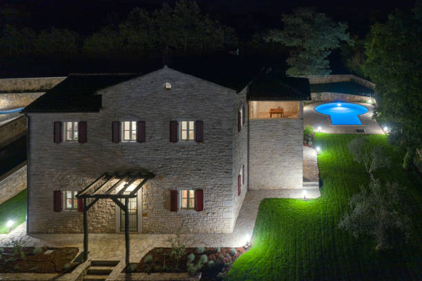 istock Luxurious beautiful modern villa with swimming pool and yard garden 1349182197