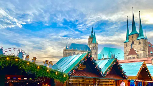 view to christmas market at old town square, erfurt, thuringia, germany with dramatic sky