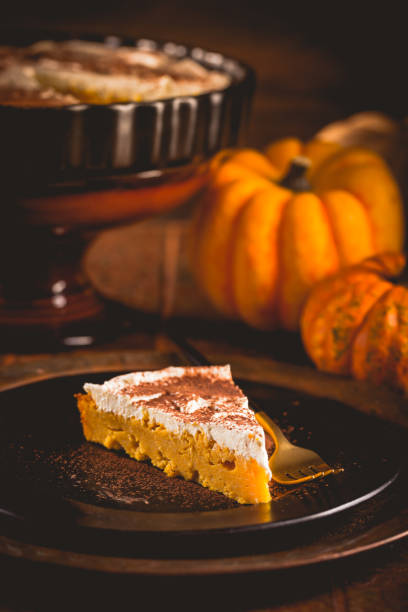 istock Homemade pumpkin pie with icing for Thanksgiving 1349185953