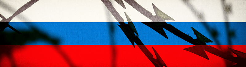 Flag of Russia and barbed wire