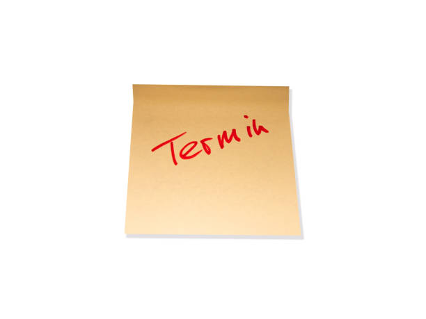 istock Yellow note with the word Termin (appointment) in red 1349187355