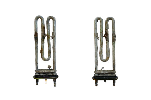 istock Two Rusty heating heater from the washing machine on a white background 1349189983
