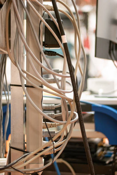 istock Power extension cord with multiple sockets, multiple power cords plugged in, inside a lab. Close up shot, shallow depth of field, no people. Neat and tidy 1349190090