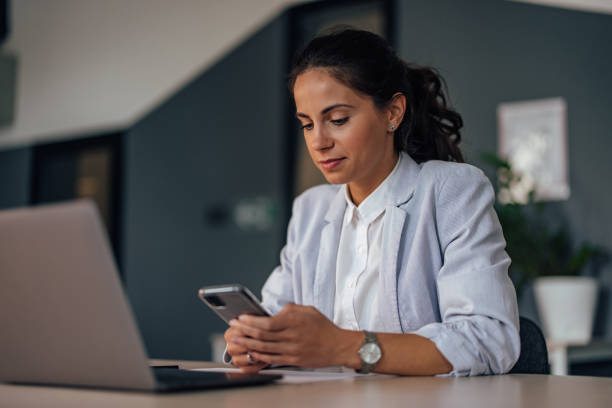 istock Adult woman, checking her email. 1349190456