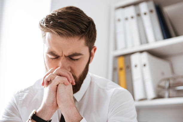 istock Concentrated young businessman sitting in office 1349191251