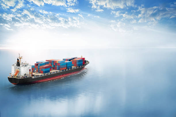 Container cargo ship in the ocean at sunset sky, Global business logistics import export background, Freight transportation, Shipping