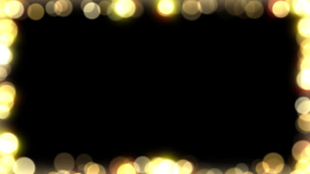 Christmas bokeh lights frame background with alpha channel in warm lights