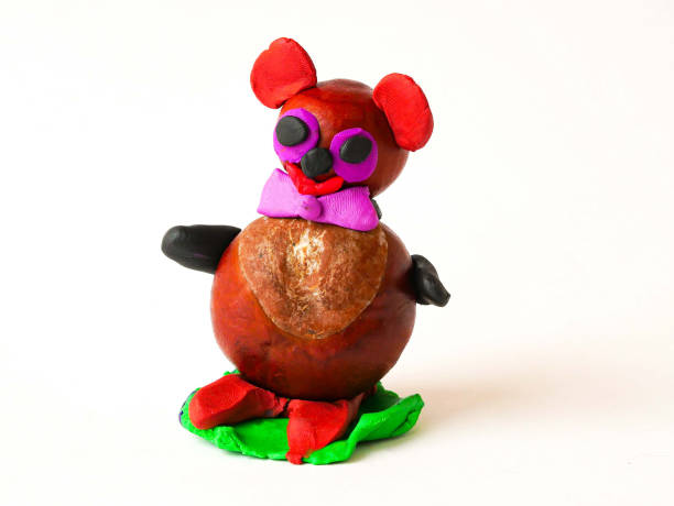 istock Bear children's craft from chestnut and plasticine 1349195086