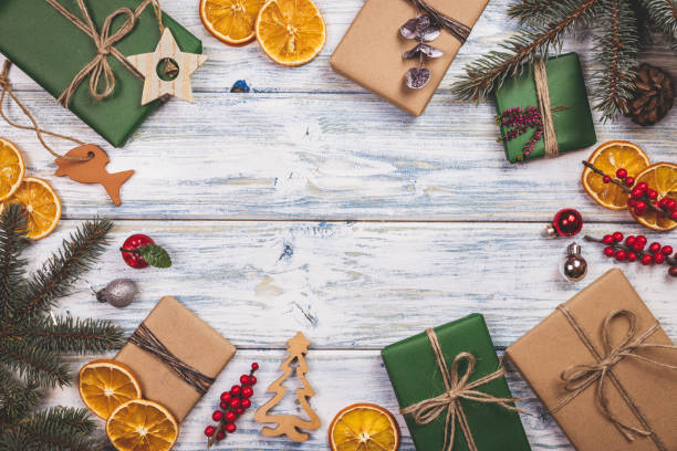 istock Christmas presents and ornaments on white wood table 1349197111
