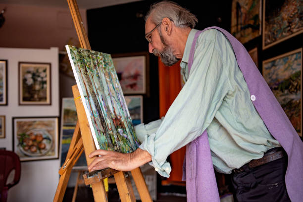 istock Senior artist painting 1349197248