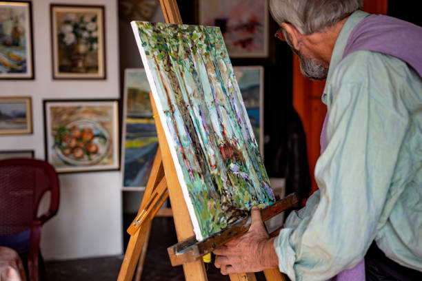 istock Senior artist painting 1349197249