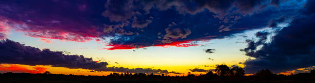 istock sunset panorama. sunset over a forest in Poland 1349197275