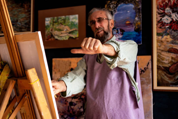 istock Senior artist painting 1349197304