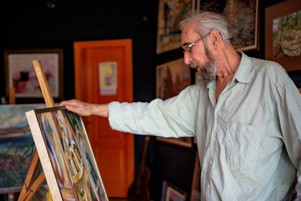 istock Senior artist painting 1349198555