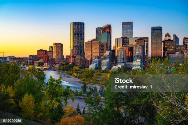 Sunset Above City Skyline Of Calgary With Bow River Canada Stock Photo - Download Image Now