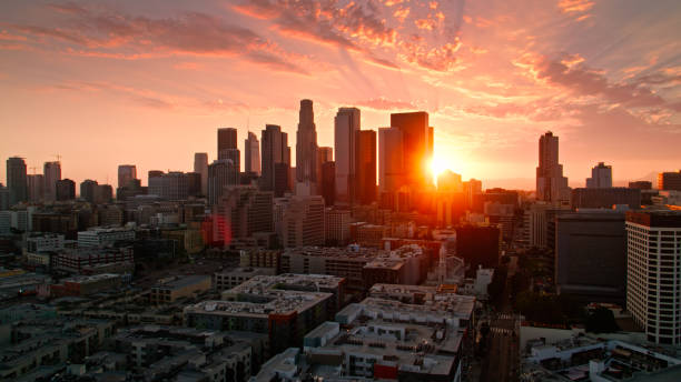 istock Sun Setting Behind Skyline of Downtown Los Angeles Financial District 1349203359