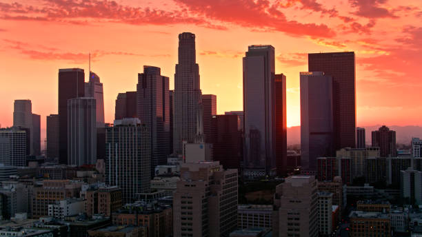 istock Fiery Sunset Sky Behind Los Angeles Downtown Skyline - Aerial 1349203507