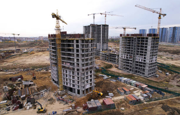 istock Tower crane at construction and the built environment. Crane during formworks on construction site. 1349203820